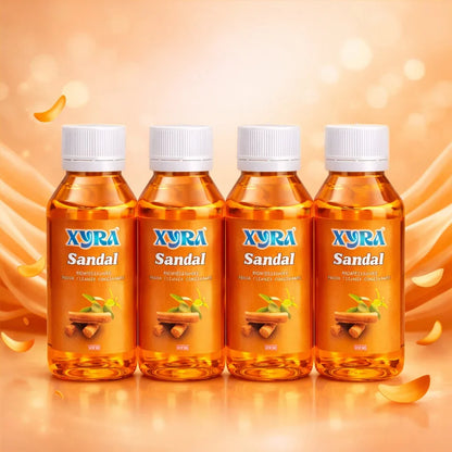 Four bottles of sandal floor cleaner concentrate with a warm orange background and sandalwood illustration.