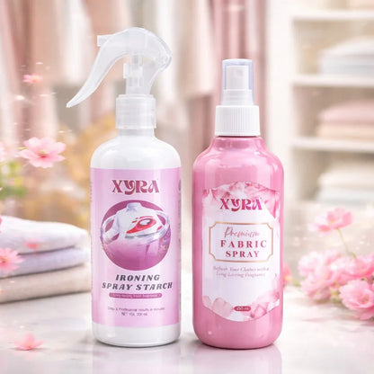 Ironing spray starch and premium fabric spray bottles on a clean surface with soft floral decor