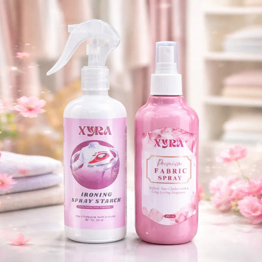 Ironing spray starch and premium fabric spray bottles on a clean surface with soft floral decor
