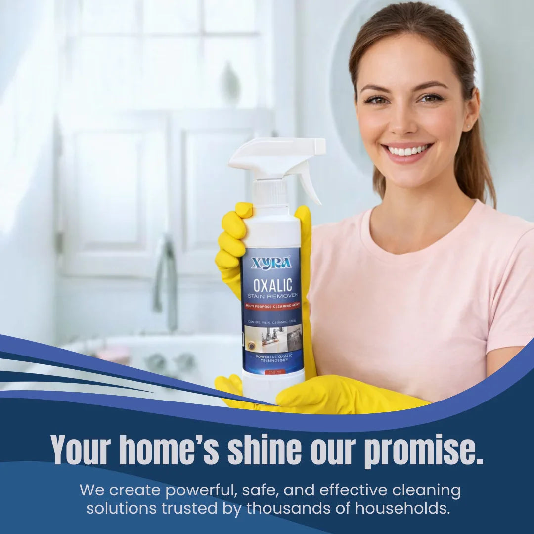 Woman with yellow gloves holding oxalic multi-purpose stain remover spray in a bright bathroom