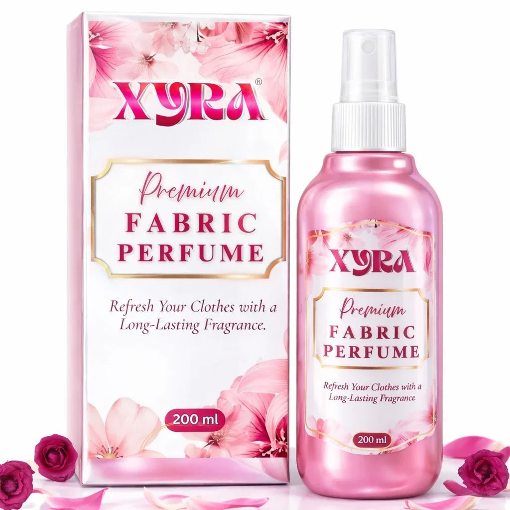 Pink fabric perfume spray bottle and box with floral design, labeled 200ml, surrounded by rose petals.