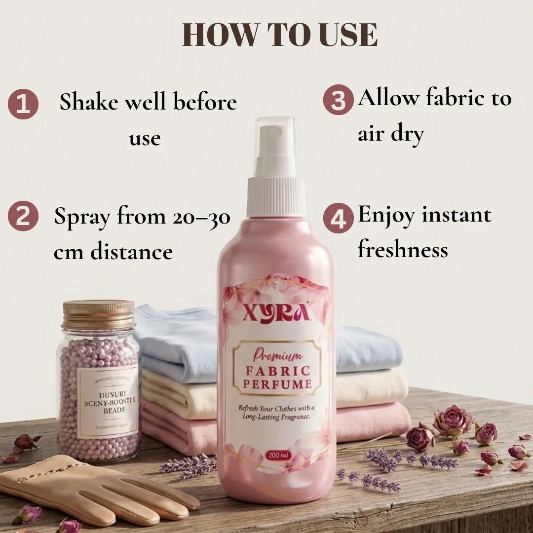 Fabric perfume spray bottle for clothes with instructions, folded laundry, and scent beads